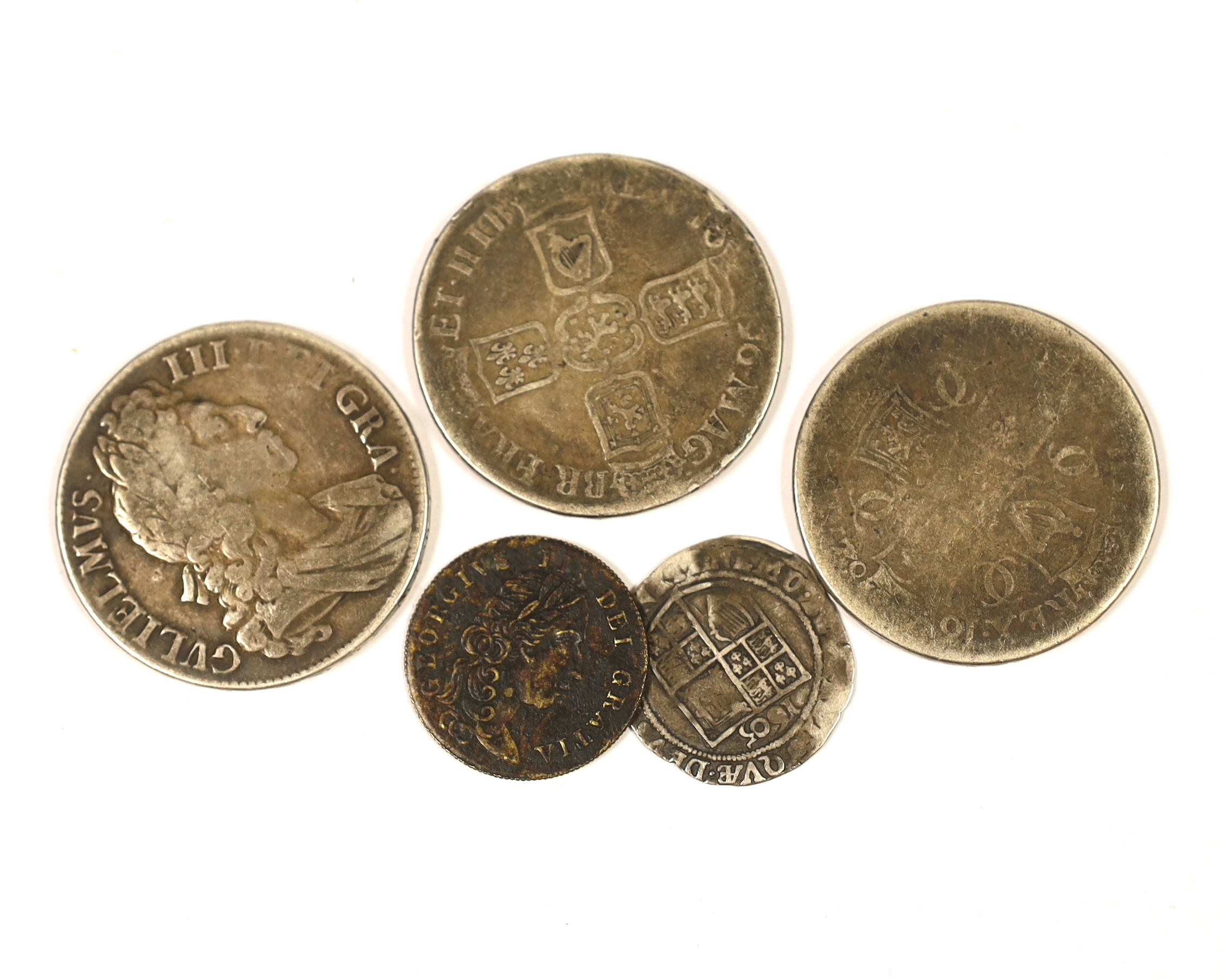 British silver coins - a Charles II crown 1682, two William III silver crowns, 1696, a James VI sixpence, 1605, together with a George III token
